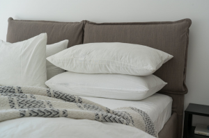 pillows stack on the bed
